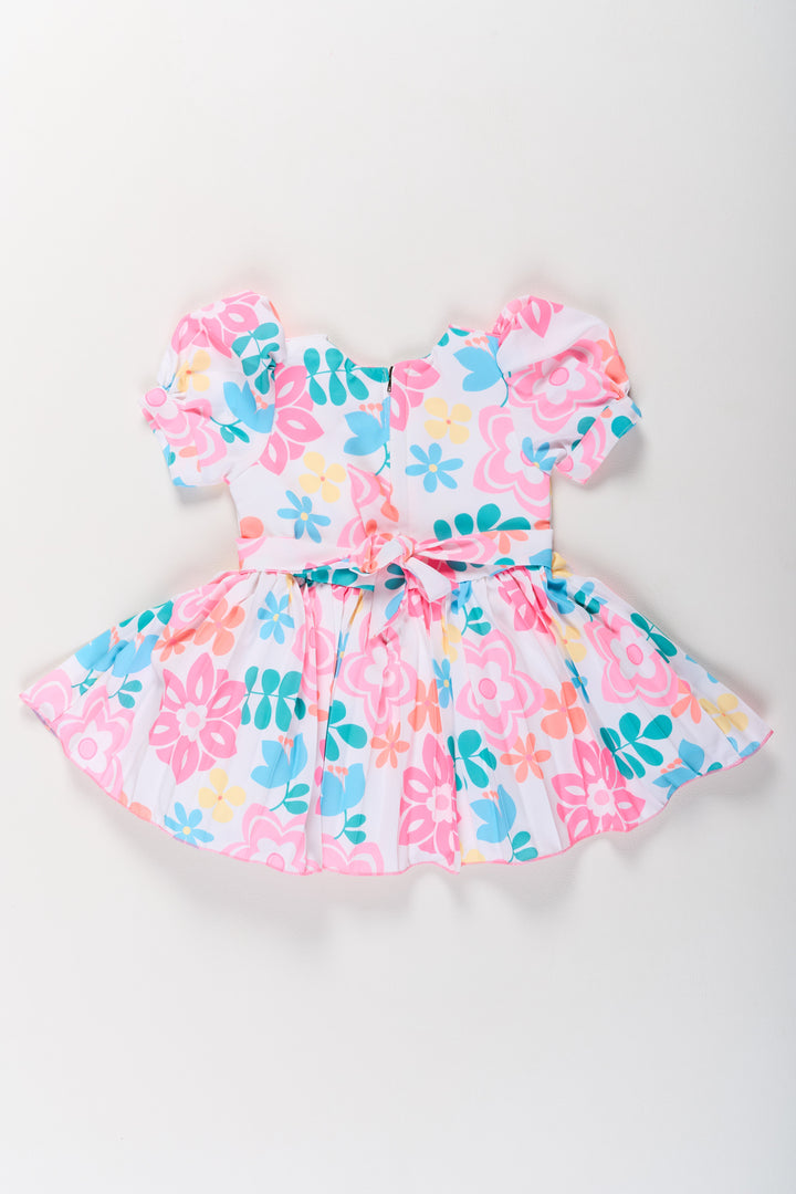 The Nesavu Girls Fancy Frock Vibrant Multicolor Georgette Flower Girls Fancy Frock with Floral Prints and Puff Sleeves Nesavu Vibrant Multicolor Georgette Flower Girls Fancy Frock Floral Prints Puff Sleeves | The Nesavu