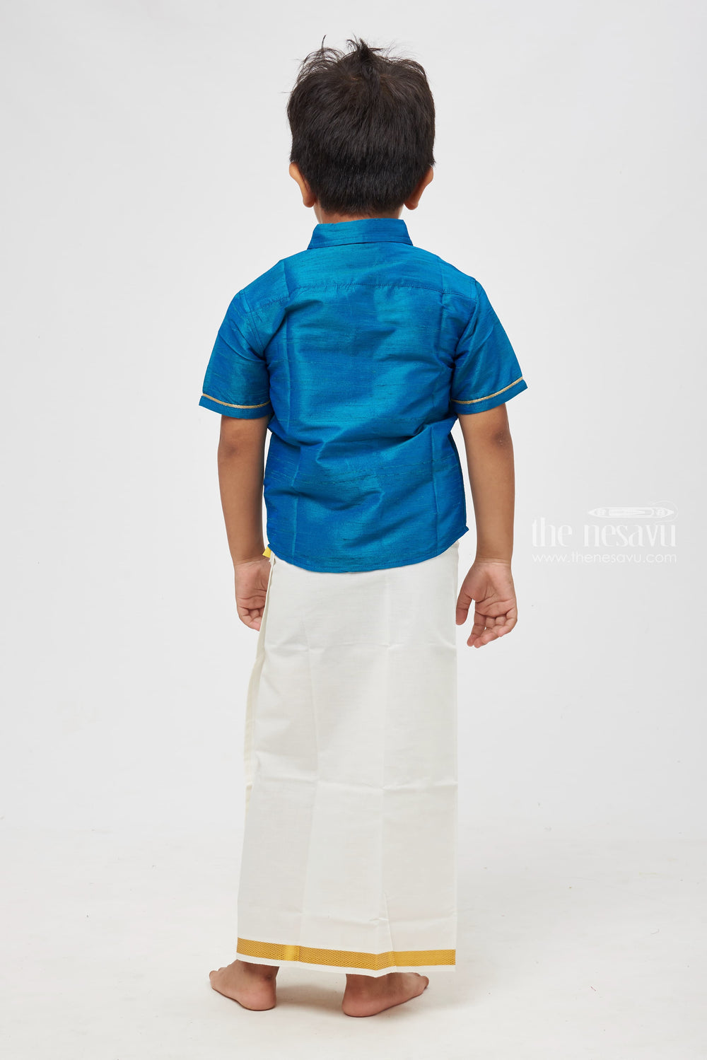 The Nesavu Boys Silk Shirt Vibrant Teal Blue Silk Shirt for Boys: A Modern Twist to Traditional Elegance Nesavu Boys Radiant Teal Blue Silk Shirt: Oceanic Hues Meet Urbane Sophistication | The Nesavu