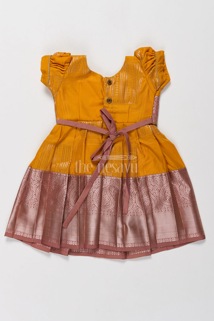 The Nesavu Girls Kanchi Silk Frock Vibrant Yellow and Bronze Long Frock Pattu Designs for Girls in Blend Silk Nesavu Nesavus Yellow Bronze Long Frock Pattu Designs Girls Blend Silk