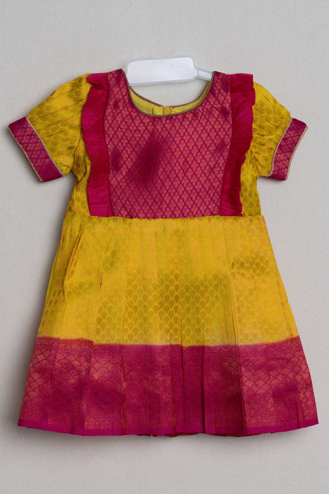 The Nesavu Girls Kanchi Silk Frock Vibrant Yellow Pink Banarasi Soft Silk / Pattu Frocks For Toddler Girl With Ruffle Yoke Nesavu 14 (6M) / Yellow / Small Border SF610B Traditional Silk Wear Frock | Latest Kanchi Silk Dress | The Nesavu