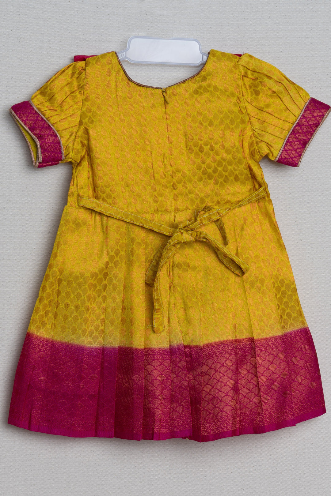 The Nesavu Girls Kanchi Silk Frock Vibrant Yellow Pink Banarasi Soft Silk / Pattu Frocks For Toddler Girl With Ruffle Yoke Nesavu Traditional Silk Wear Frock | Latest Kanchi Silk Dress | The Nesavu