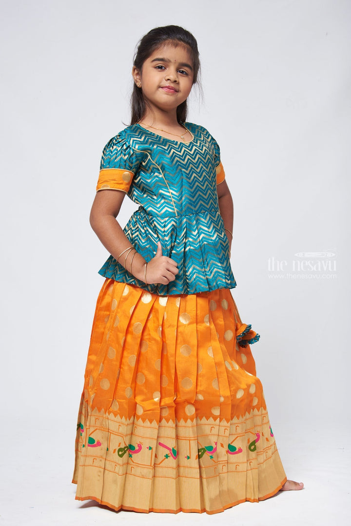 The Nesavu Pattu Pavadai Vibrant Zig Zag Green Peplum Blouse with Zari Butta Orange Pattu Pavadai: Traditional Festive Charm Nesavu Pattu Pavadai Latest Design | Pattu Pavadai for Festivals | The Nesavu