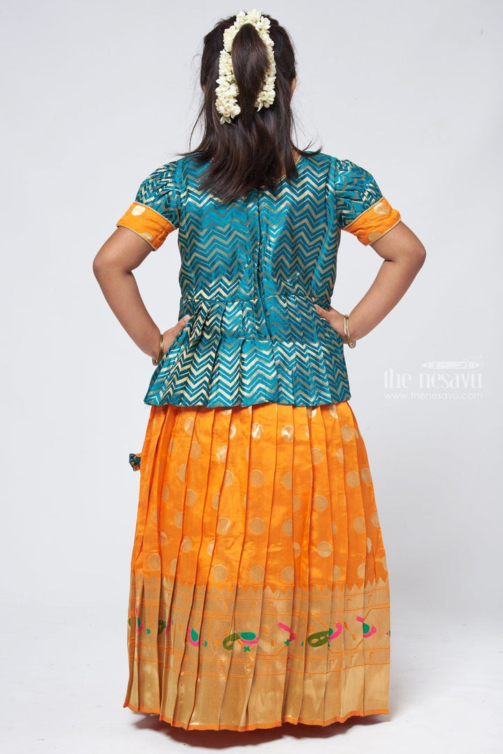 The Nesavu Pattu Pavadai Vibrant Zig Zag Green Peplum Blouse with Zari Butta Orange Pattu Pavadai: Traditional Festive Charm Nesavu Pattu Pavadai Latest Design | Pattu Pavadai for Festivals | The Nesavu