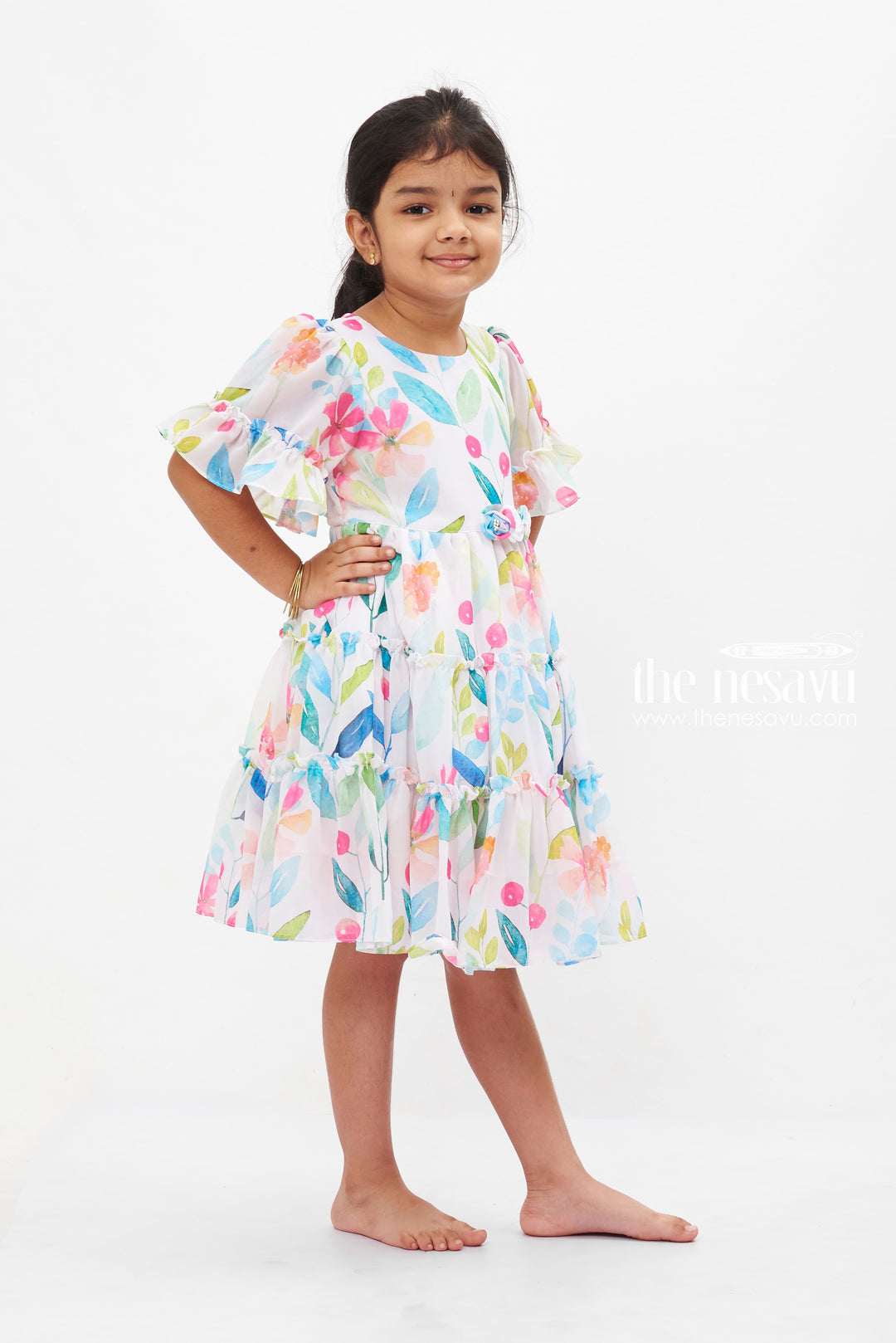 The Nesavu Girls Fancy Frock Watercolor Garden Party Frock: Vibrant Floral Print Dress for Girls with Flutter Sleeves Nesavu Girls Flutter Sleeve Floral Dress | Watercolor Print Summer Frock | Festive Kids Wear