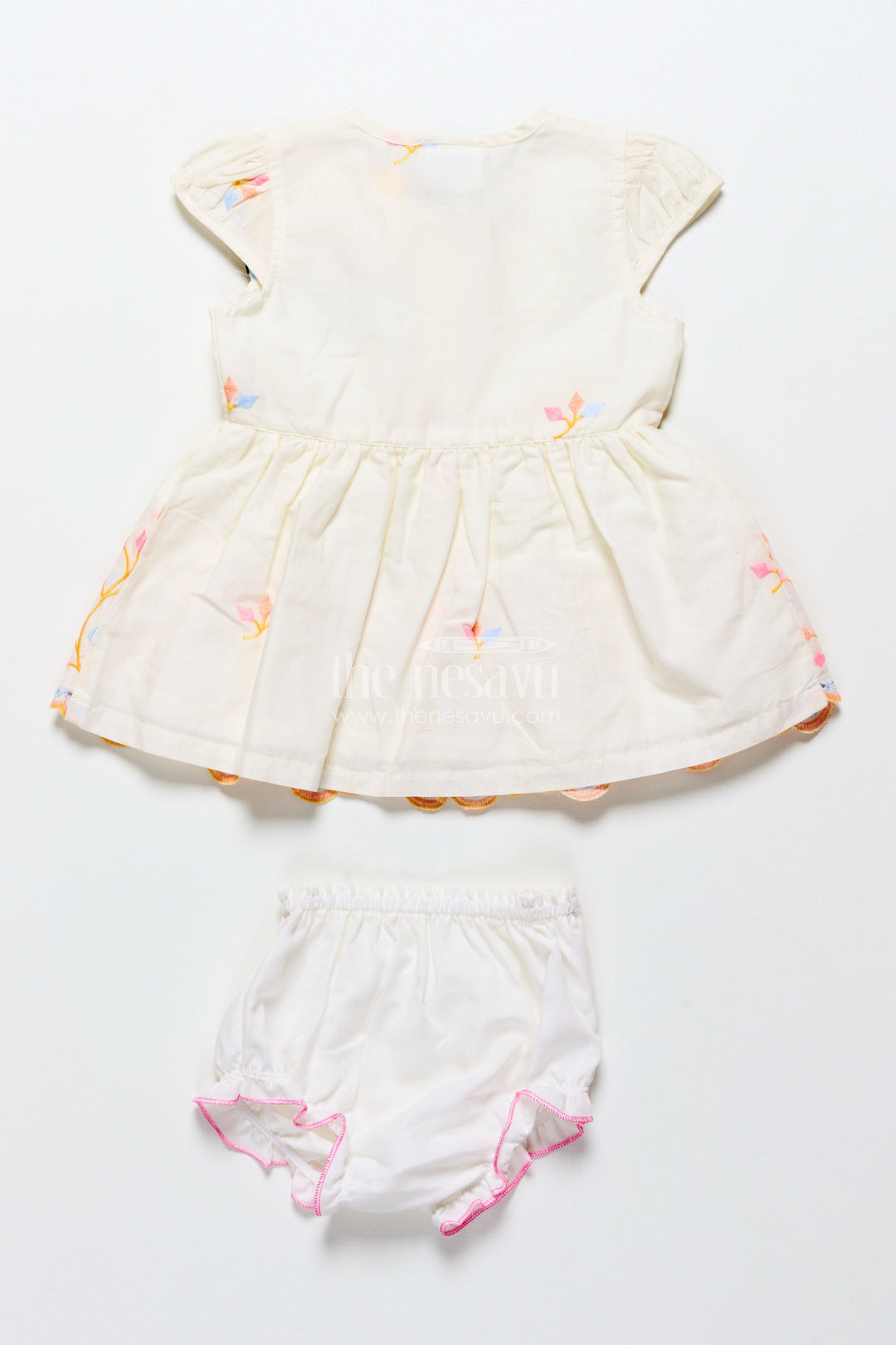 The Nesavu Baby Frocks White Baby Frock with Pastel Floral Embroidery and Ruffled Hem Nesavu Nesavu white baby frock with pastel embroidery and bloomer set
