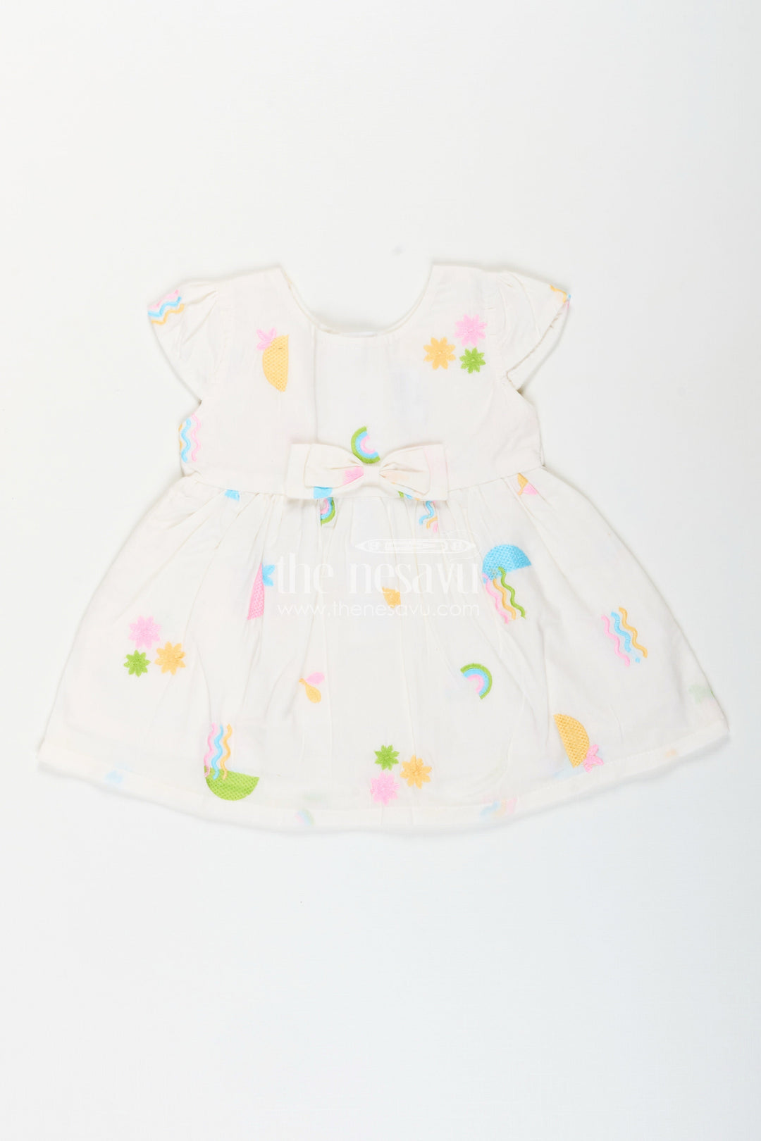 The Nesavu Baby Cotton Frocks White baby girl frock with pastel embroidery for everyday wear Nesavu 14 (6M) / White BFJ856B-14 Nesavu white baby girl frock with pastel rainbow embroidery and flutter sleeves for casual wear