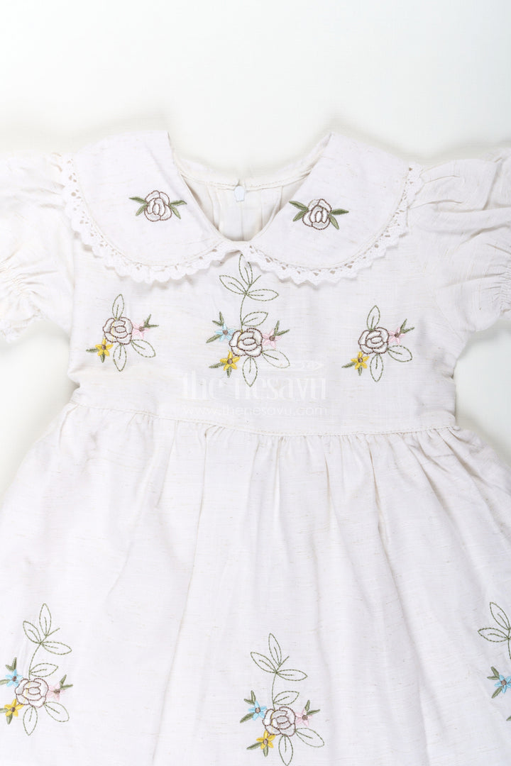 The Nesavu Girls Cotton Frock White Cotton Frocks for Girls with Floral Embroidery Puff Sleeves and Peter Pan Collar Nesavu Nesavu White Cotton Frocks for Girls with Embroidery Puff Sleeves and Peter Pan Lace Collar