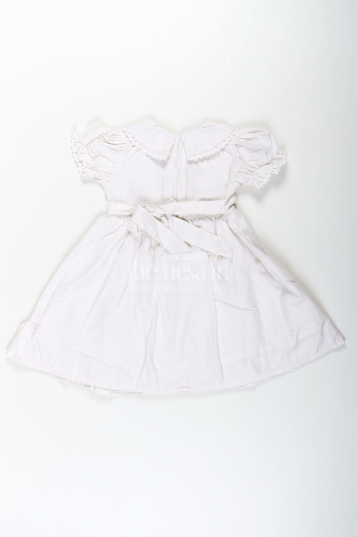 The Nesavu Girls Cotton Frock White Cotton Frocks for Girls with Floral Embroidery Puff Sleeves and Peter Pan Collar Nesavu Nesavu White Cotton Frocks for Girls with Embroidery Puff Sleeves and Peter Pan Lace Collar