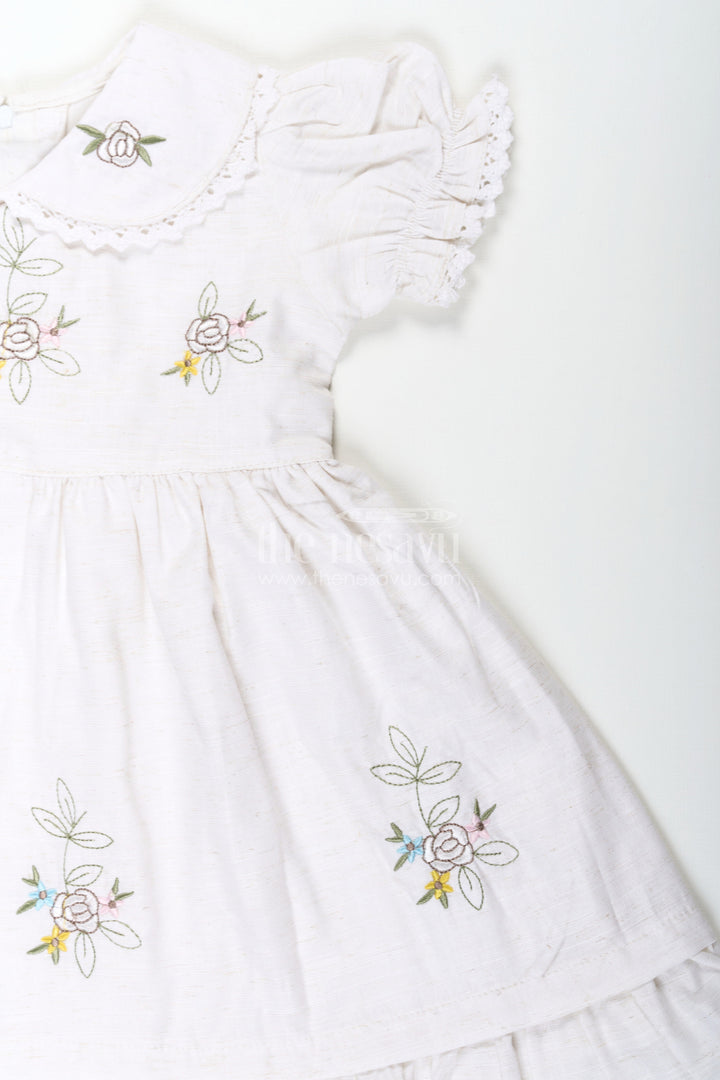 The Nesavu Girls Cotton Frock White Cotton Frocks for Girls with Floral Embroidery Puff Sleeves and Peter Pan Collar Nesavu Nesavu White Cotton Frocks for Girls with Embroidery Puff Sleeves and Peter Pan Lace Collar
