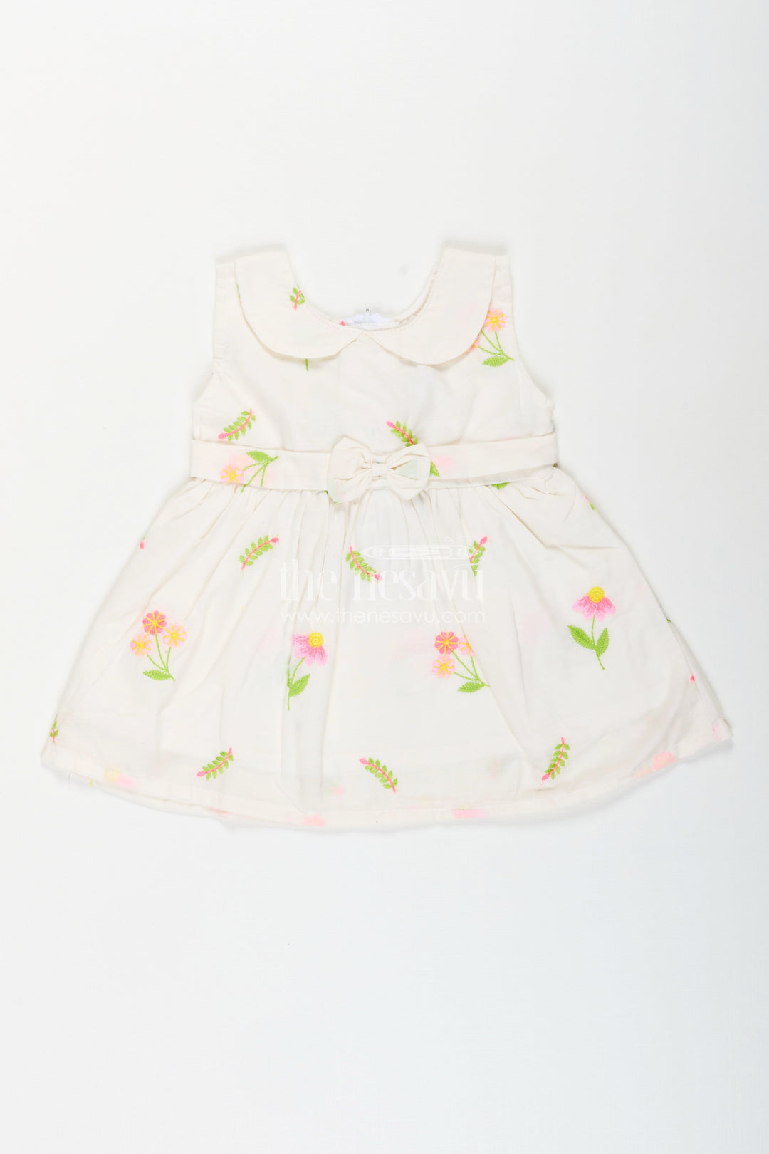 The Nesavu Baby Cotton Frocks White frock for baby girls with floral embroidery and waist bow Nesavu 14 (6M) / White BFJ854A-14 Nesavu white cotton frock for baby girls with bow and floral embroidery for casual dressing