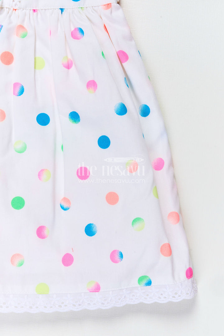 The Nesavu Baby Cotton Frocks White Newborn Clothes in Cotton with Neon Polka Dot Print and Frilly Sleeves for Baby Girls Nesavu Nesavu White Cotton Newborn Clothes Neon Polka Dots Lace Trimmed Sleeves Baby Girls