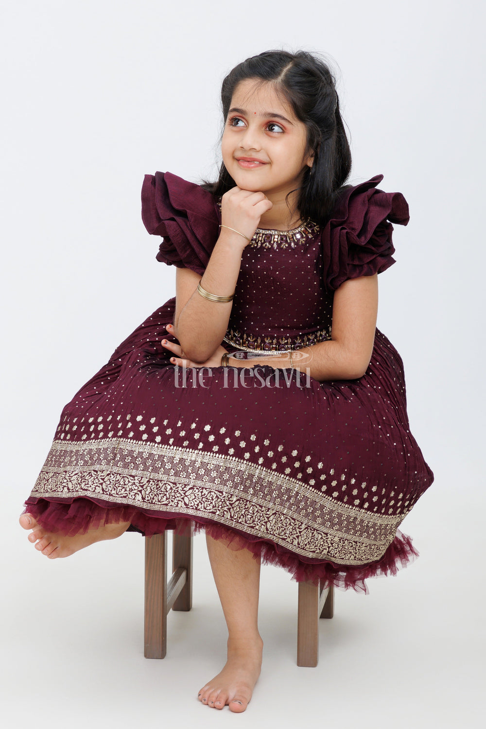 The Nesavu Silk Party Frock Wine Color Blended Silk Party Frock with Embroidered Neckline and Foil Print for Girls Nesavu Wine Color Blended Silk Party Frock with Embroidered Neckline for Girls Nesavu