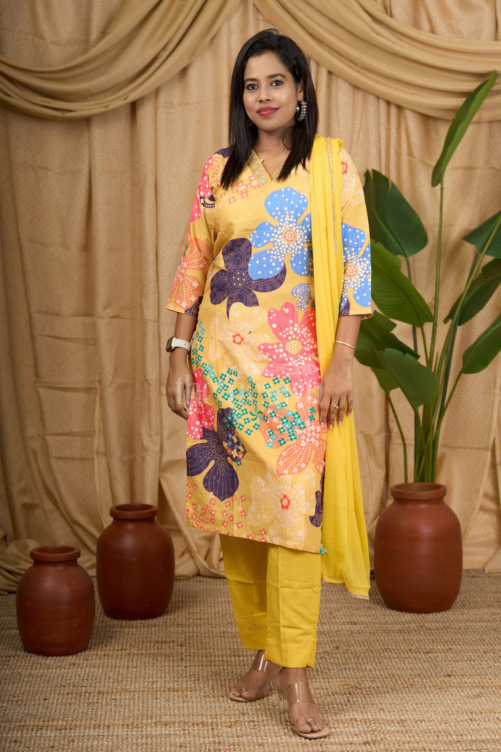 The Nesavu Womens Flared Kurthas Women's Mustard Yellow Straight Suit Set with Multi-Color Floral Print and Mirrorwork Neckline Nesavu Nesavu Women's Mustard Yellow Straight Suit Set Multi-Color Floral Print Mirrorwork