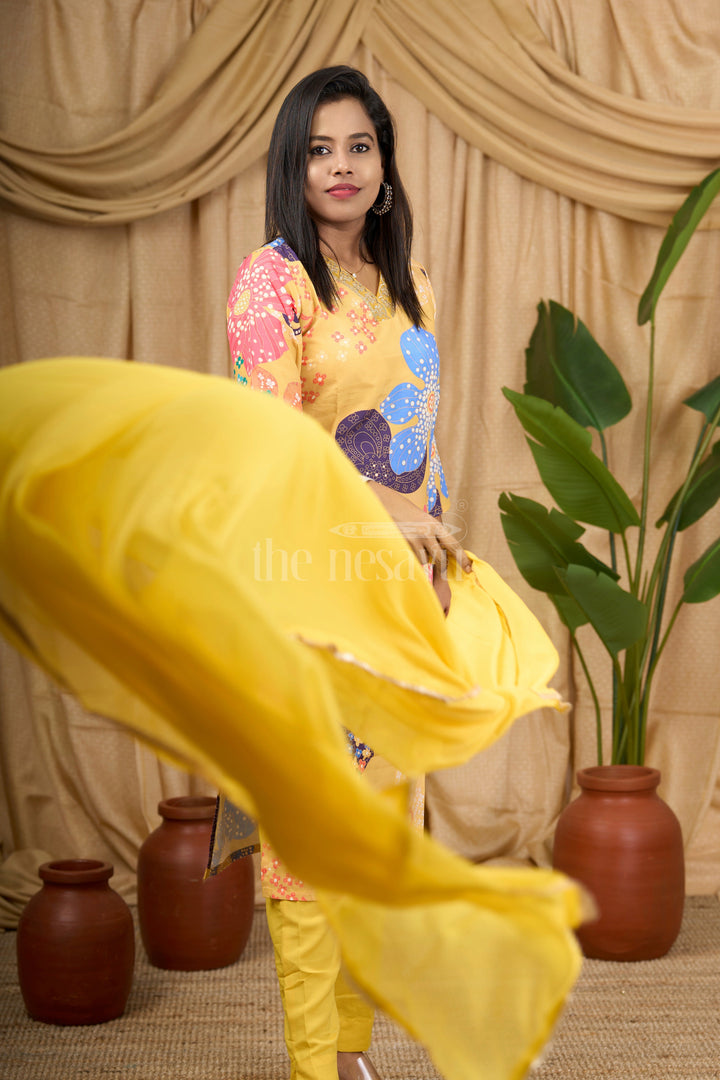 The Nesavu Womens Flared Kurthas Women's Mustard Yellow Straight Suit Set with Multi-Color Floral Print and Mirrorwork Neckline Nesavu Nesavu Women's Mustard Yellow Straight Suit Set Multi-Color Floral Print Mirrorwork
