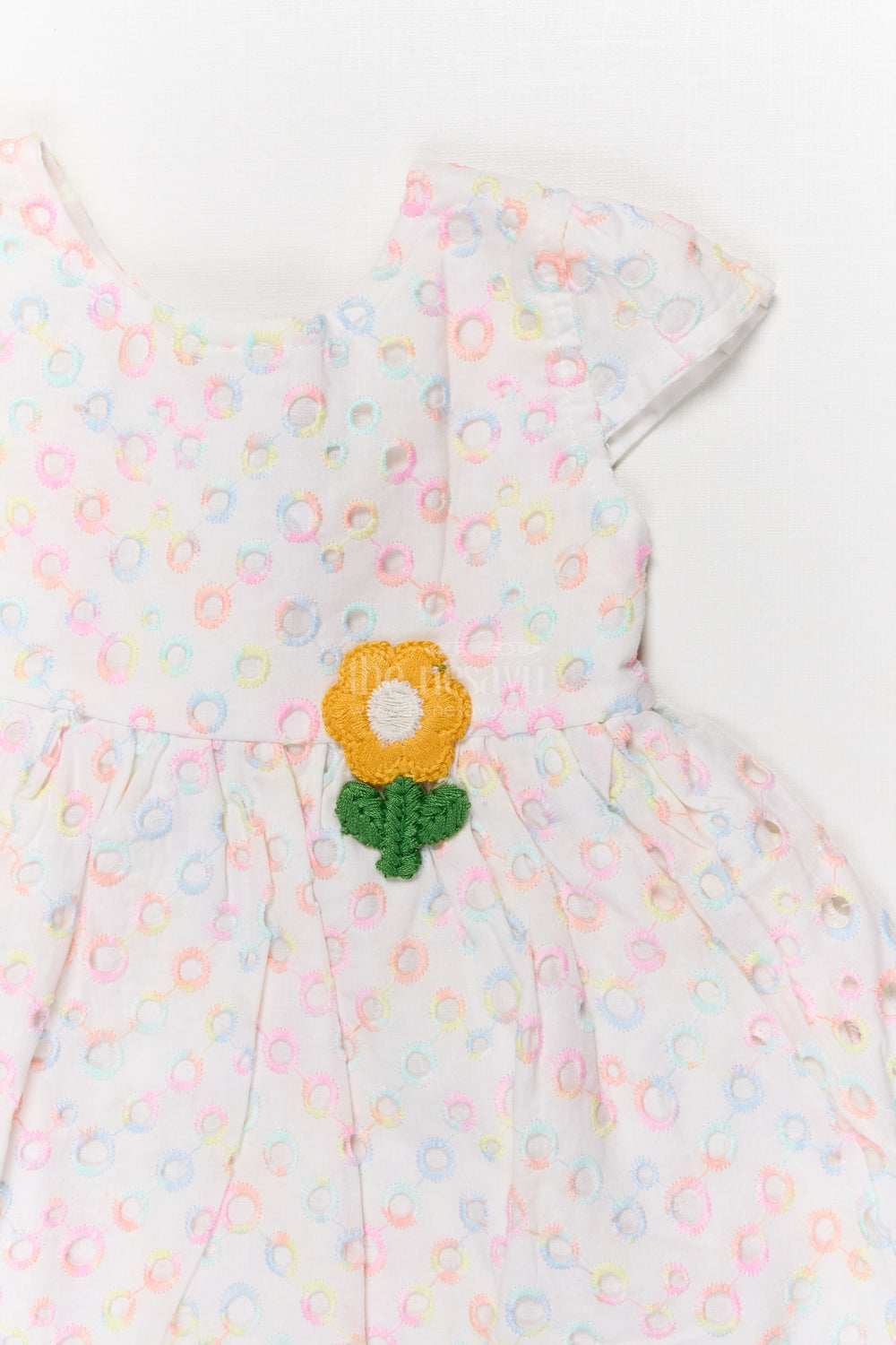 The Nesavu Baby Cotton Frocks Yellow Baby Girl Hakoba Frock with Floral Patch and Pastel Circle Embroidery Nesavu Nesavu yellow Hakoba cotton frock for baby girls with embroidery and flower patch