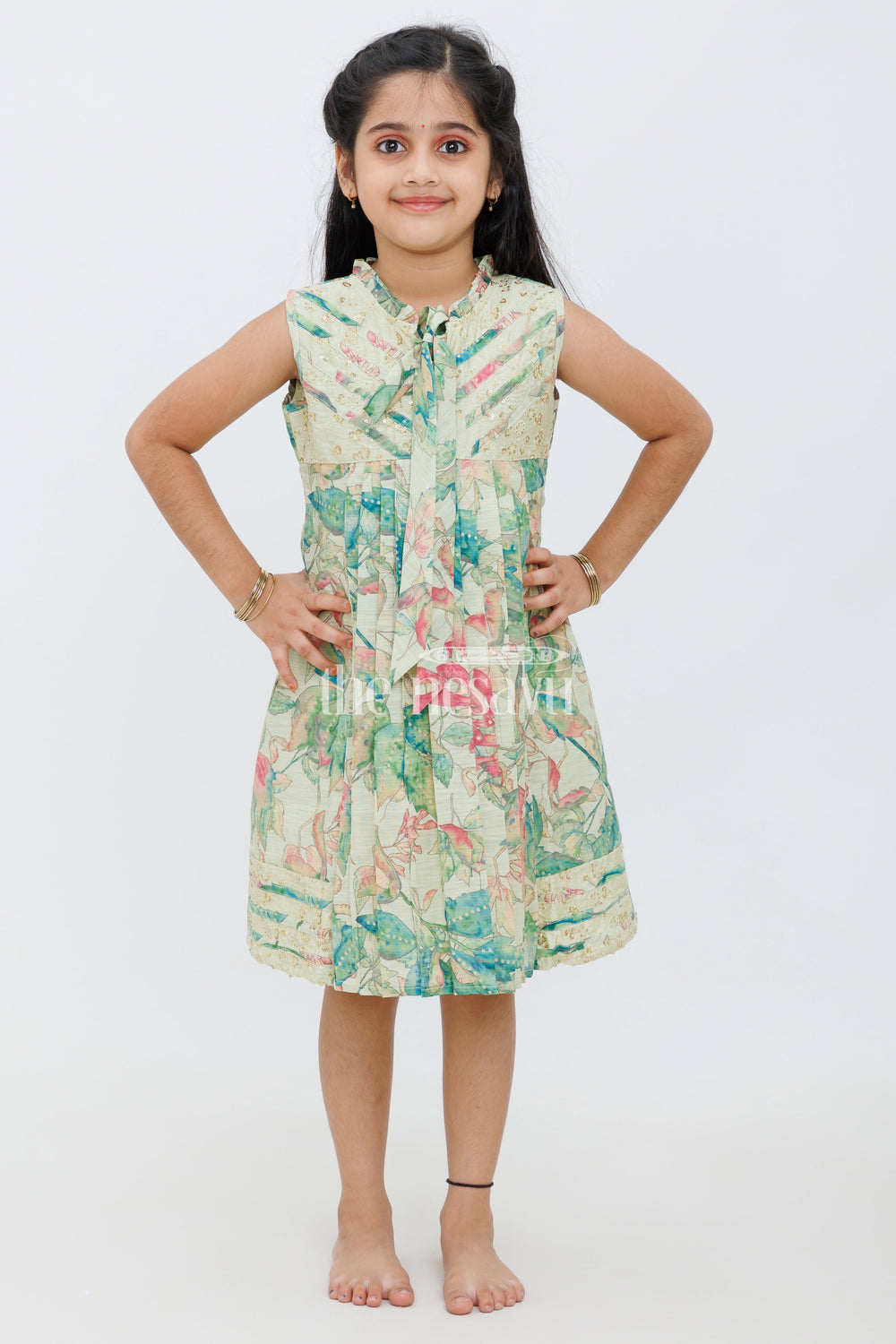 The Nesavu Girls Cotton Frock Yellow Chanderi Frock with Watercolor Floral Print and Pleated Design for Girls Nesavu Yellow Chanderi Frock with Floral Print and Pleats for Girls Nesavu