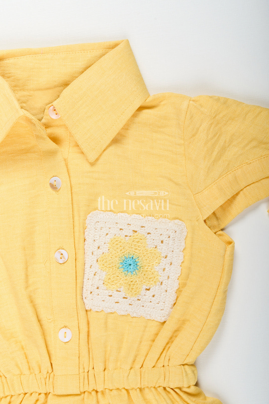 The Nesavu Girls Cotton Frock Yellow collared cotton frock with crochet detail for girls Nesavu Nesavu girls yellow cotton frock with collar and crochet pocket for casual summer wear
