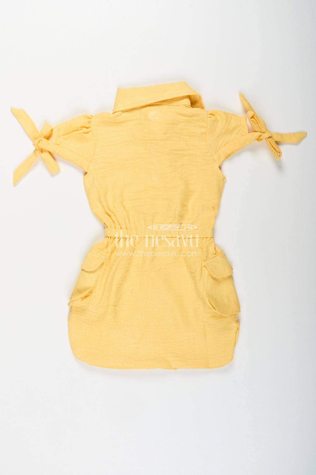 The Nesavu Girls Cotton Frock Yellow collared cotton frock with crochet detail for girls Nesavu Nesavu girls yellow cotton frock with collar and crochet pocket for casual summer wear