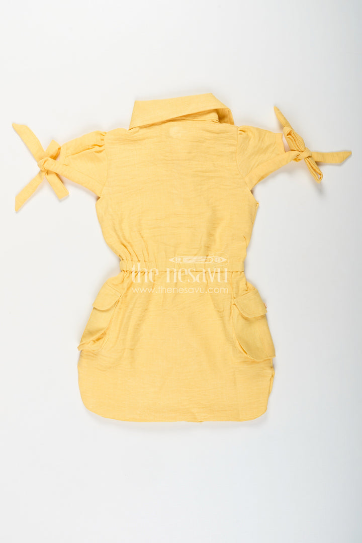 The Nesavu Girls Cotton Frock Yellow collared cotton frock with crochet detail for girls Nesavu Nesavu girls yellow cotton frock with collar and crochet pocket for casual summer wear
