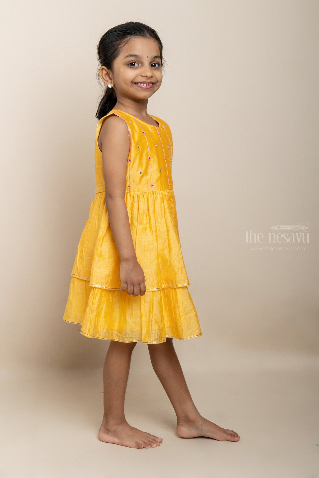 The Nesavu Girls Fancy Frock Yellow Double-Tiered Cotton Gown For Baby Girls With Designer Yoke Nesavu Simple Cotton Collection 2022 | Latest Casual Wear Ideas | The Nesavu