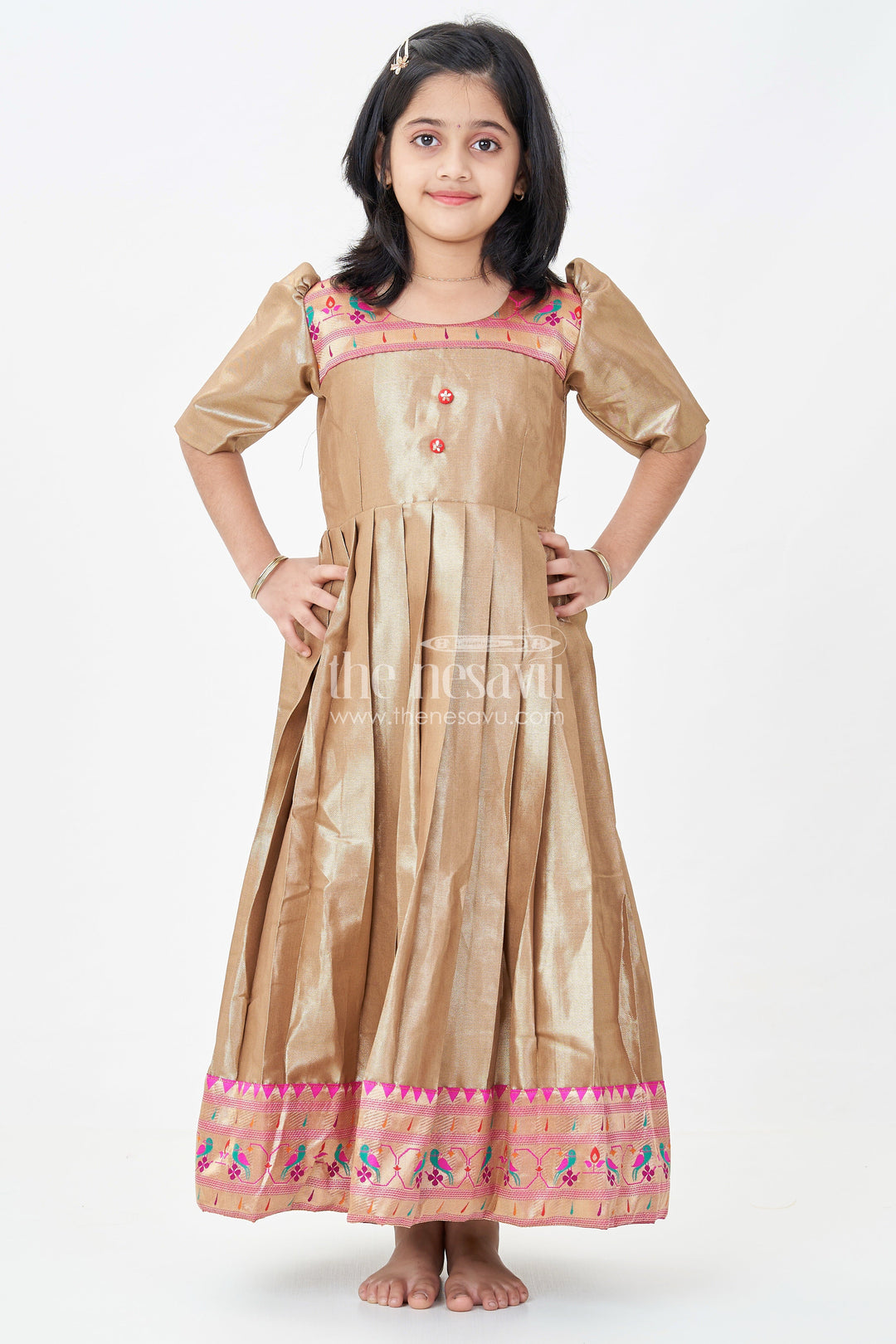 The Nesavu Girls Silk Gown Yellow Gold Gown for Girls in Tissue Silk with Rich Pleats and Paithani Embellished Hemline Nesavu Yellow Gold Gown Girls Tissue Silk Pleated Design Paithani Hemline | The Nesavu