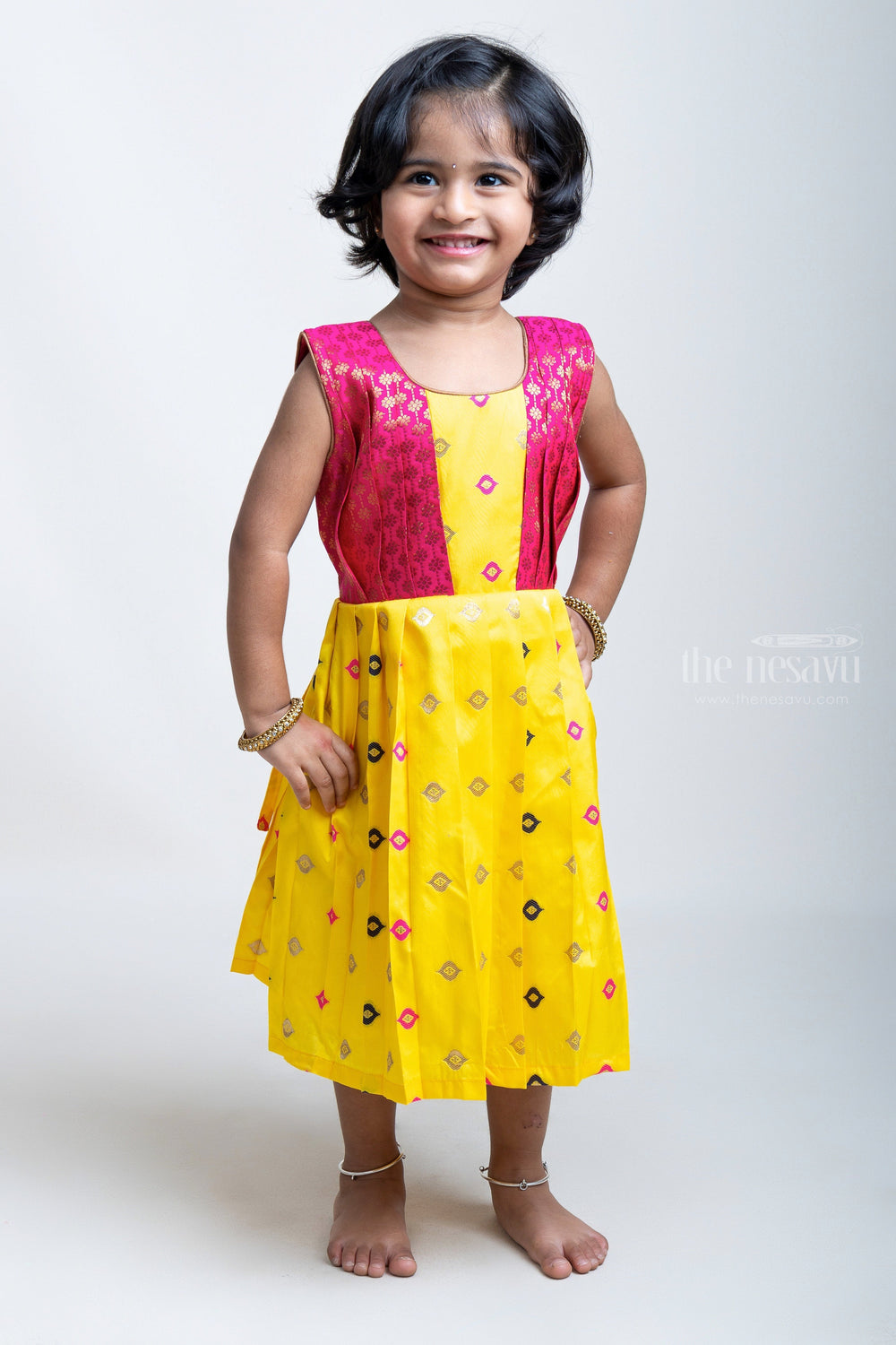 The Nesavu Silk Frock Yellow Pleated Semi-Silk with Red Designer Yoke Frock For Girls Nesavu Latest Model Frocks Designs | The Nesavu | Silk Frock Collection
