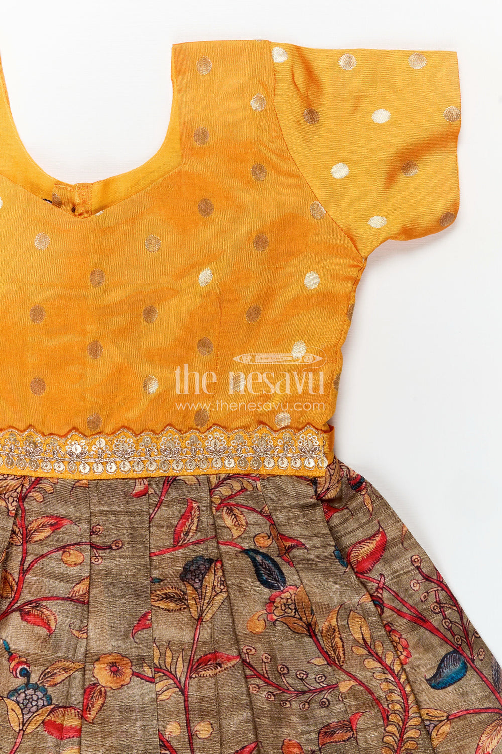 The Nesavu Silk Frock Yellow Silk Dress for Girls with Mirror Embellished Yoke and Floral Chanderi Cotton Bottom Nesavu Nesavu Yellow Silk Dress Girls Mirror Work Printed Chanderi Floral Skirt Bottom