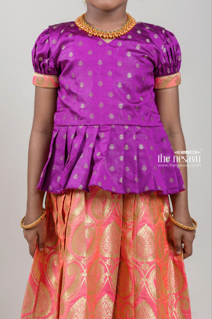 The Nesavu Pattu Pavadai Zari Butta Printed Purple Silk Peplum Blouse with Knife Pleated Pink Pattu Pavadai for Girls Nesavu Zari Butta Printed Purple Silk Peplum Blouse with Knife Pleated Pink Pattu Pavadai for Girls | Shop at The Nesavu