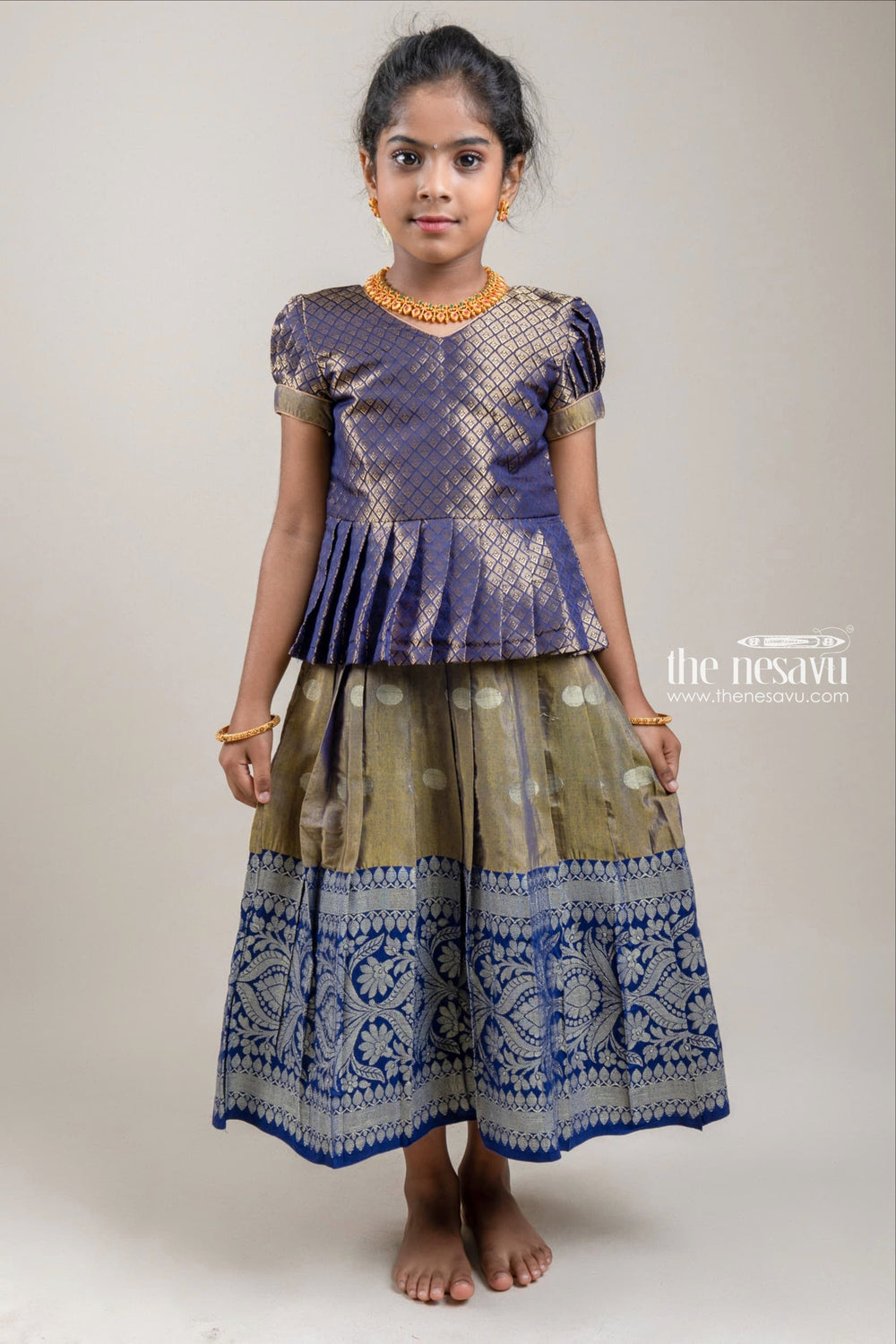 The Nesavu Pattu Pavadai Zari Designer Navy Silk Peplum Blouse with Knife Pleated Blue Silk Skirt for Girls Nesavu Zari Designer Navy Silk Peplum Blouse with Knife Pleated Blue Silk Skirt for Girls | Shop at The Nesavu