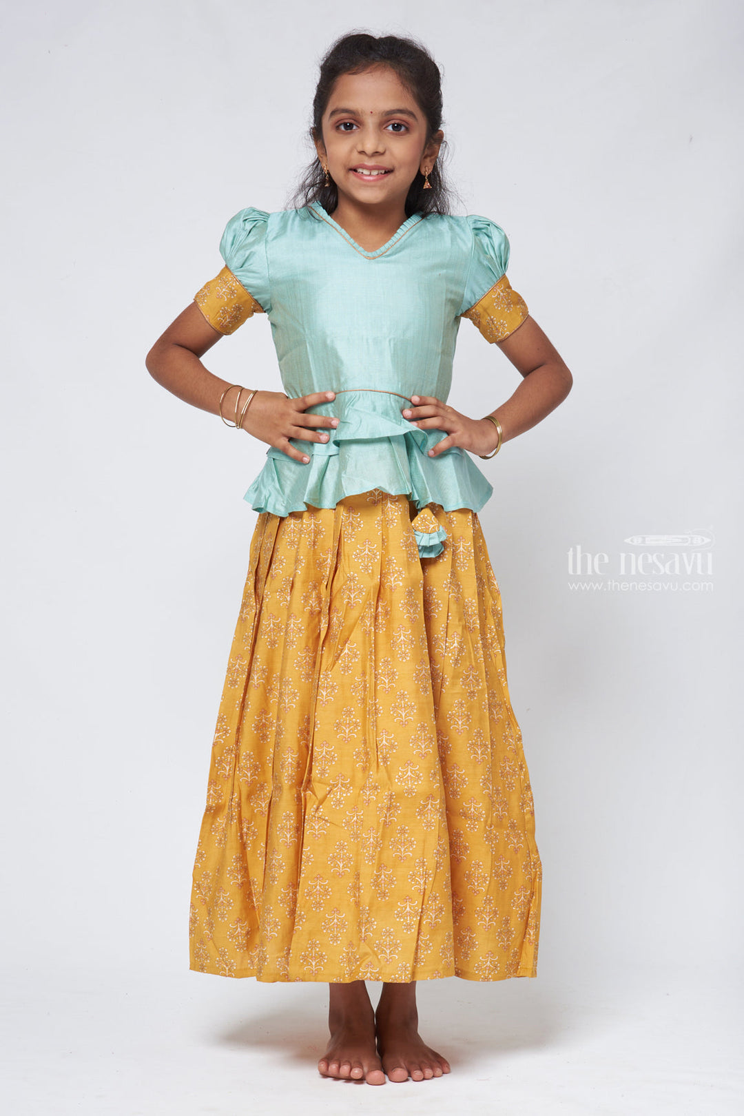 The Nesavu Pattu Pavadai Zari with Floral Printed Yellow Pleated Skirt and Green Jacquard Peplum Blouse Nesavu 16 (1Y) / Yellow GPP291A-16 Latest Style Pattu Pavadai Design | Silk Readymade Dress for Girls | The Nesavu