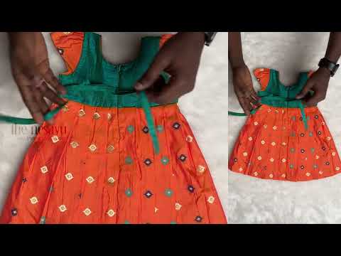 Orange Pleated Silk Frock With Banarasi Silk Contrasting Yoke