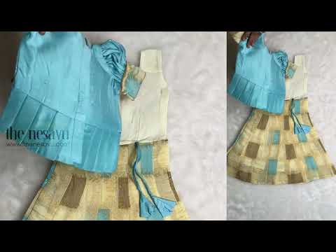 Geometrical Designer Pleated Skirt and Blue Jacquard Silk Blouse