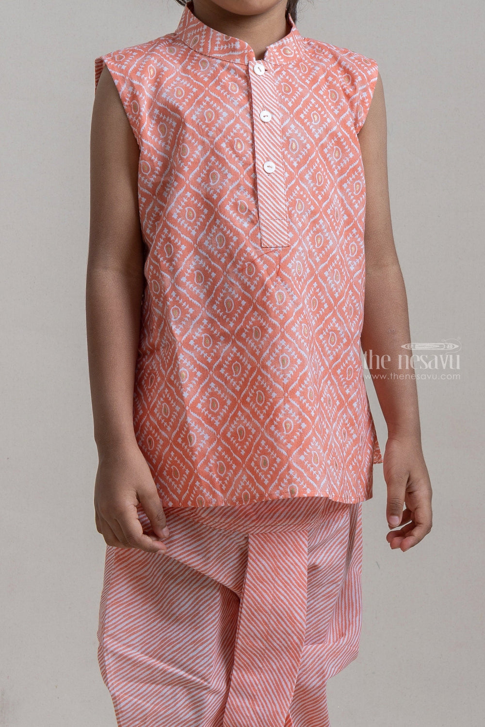 The Nesavu Ethnic Sets Amazing Salmon Tribal Printed Sleeveless Kurta With Striped Panchakacham For Boys psr silks Nesavu