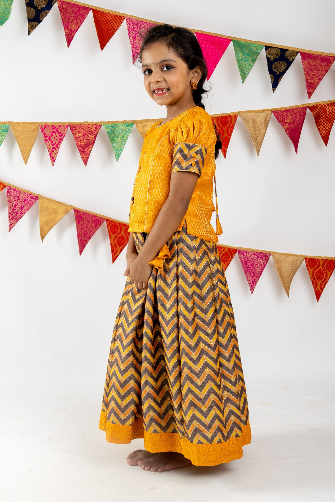 The Nesavu Pattu Pavadai Bright Yellow Jacquard Blouse With Zig Zag Printed Semi Silk Pattu Pavada psr silks Nesavu