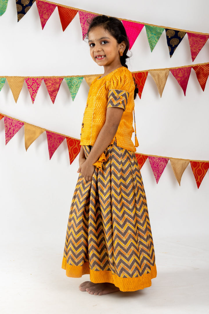 The Nesavu Pattu Pavadai Bright Yellow Jacquard Blouse With Zig Zag Printed Semi Silk Pattu Pavada psr silks Nesavu