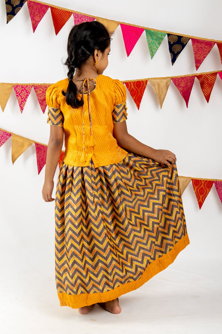 The Nesavu Pattu Pavadai Bright Yellow Jacquard Blouse With Zig Zag Printed Semi Silk Pattu Pavada psr silks Nesavu