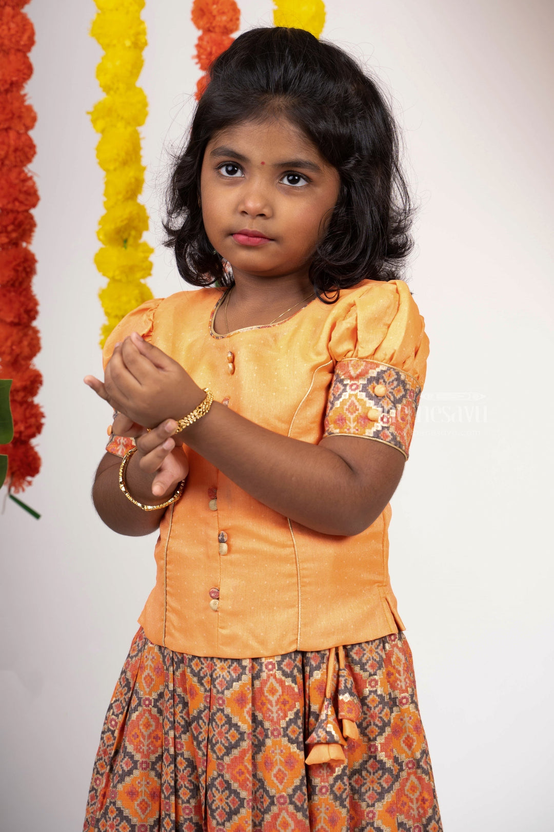 The Nesavu Pattu Pavadai Carrot Orange Silk Cotton Patola Designer Langa Voni For Baby Girls psr silks Nesavu