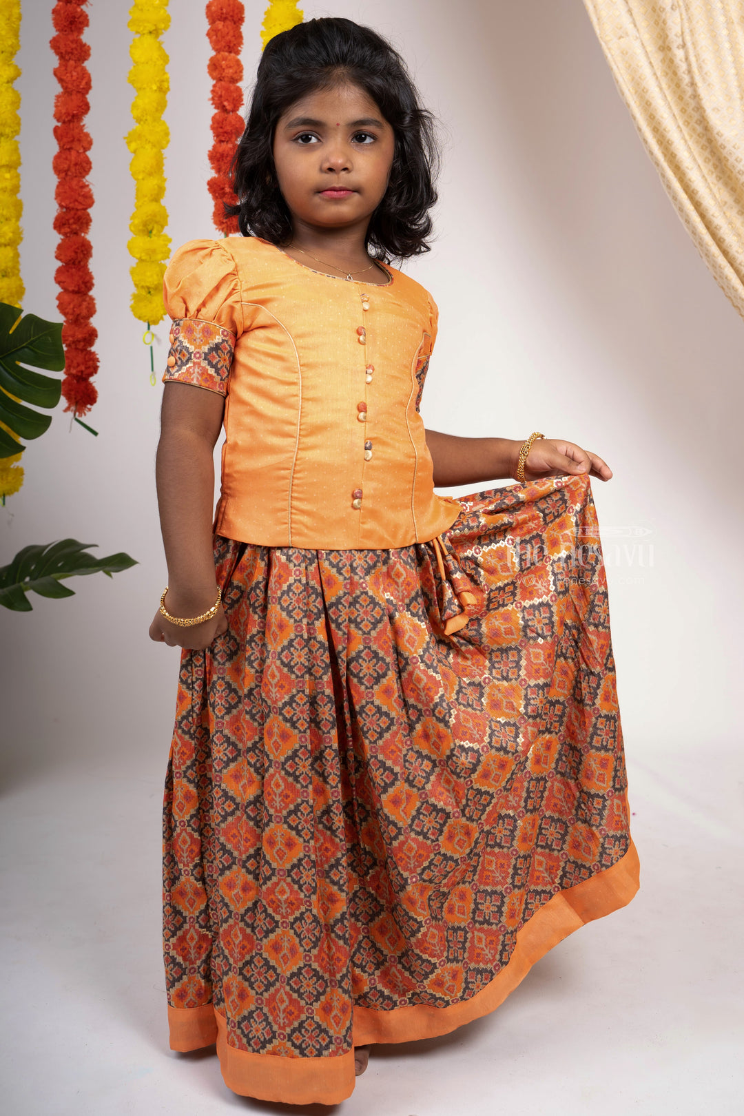 The Nesavu Pattu Pavadai Carrot Orange Silk Cotton Patola Designer Langa Voni For Baby Girls psr silks Nesavu