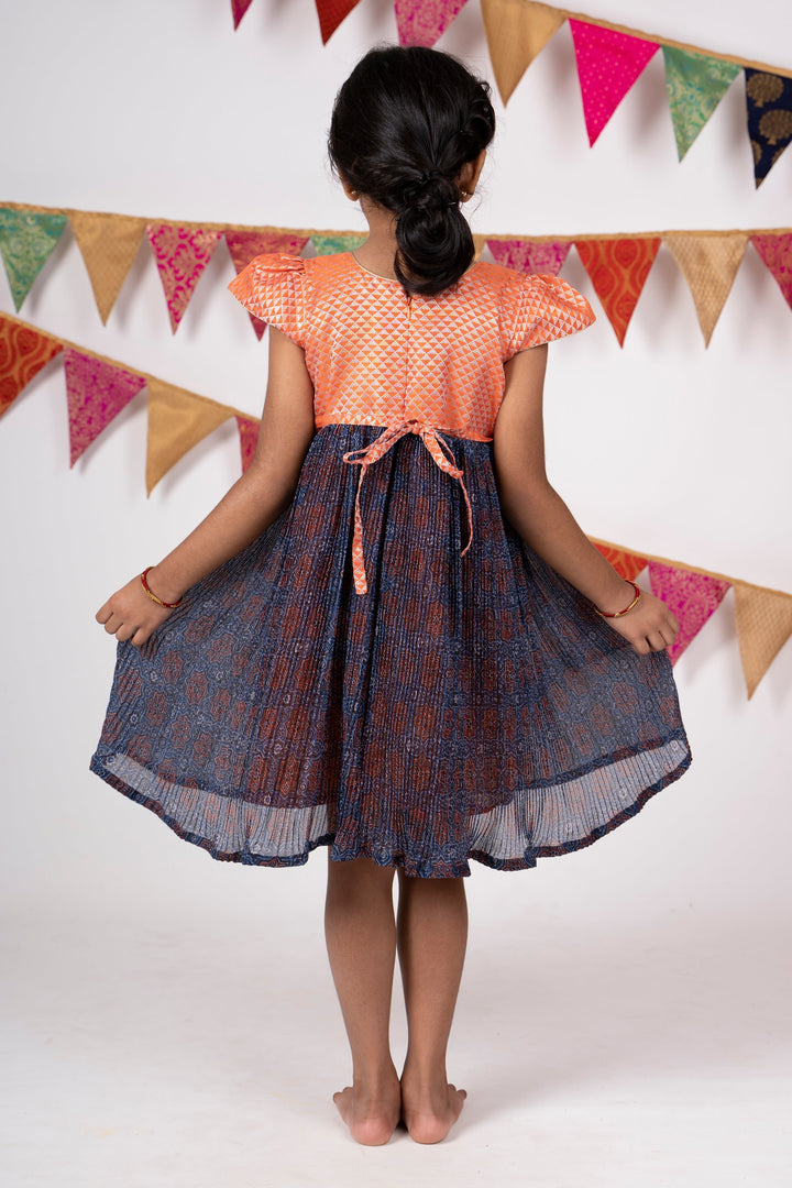 The Nesavu Frocks & Dresses Latest Crushed Semi-Cotton Gown With Contrasting Flutter Sleeve Yoke For Girls psr silks Nesavu