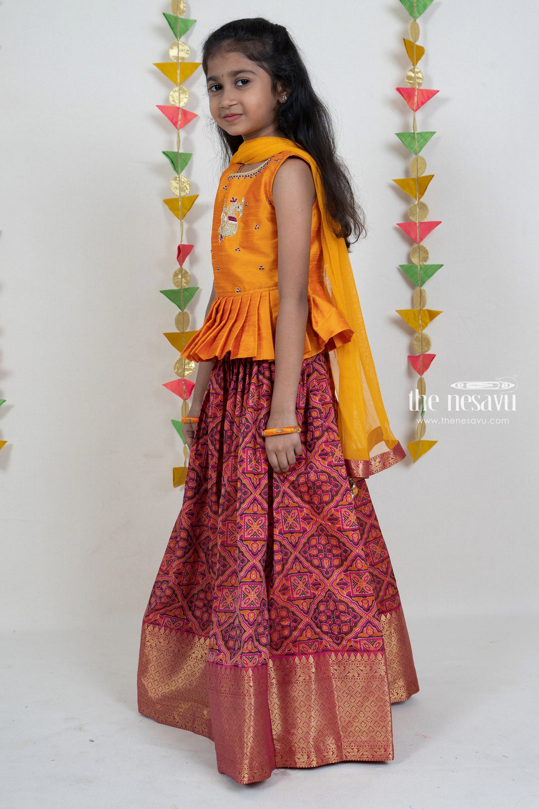 The Nesavu Pattu Pavadai Latest Designer Pink Pattu Pavada With Yellow Embroidery Peplum Pleated Blouse psr silks Nesavu
