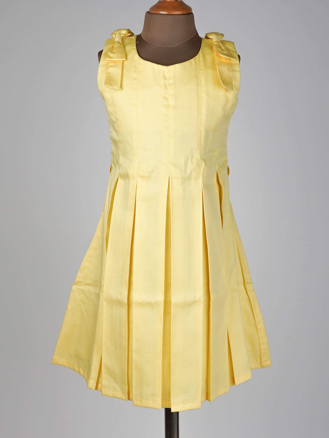 The Nesavu Frocks & Dresses Minimalistic Yellow Cotton Dress With Bow and Box Pleat Details psr silks Nesavu 16 (1Y-2Y) / yellow GFC327