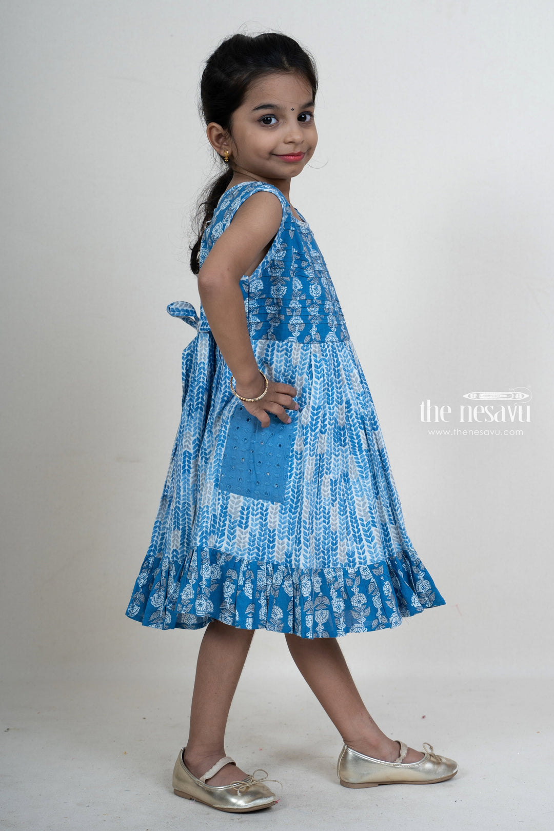The Nesavu Frocks & Dresses Navy Blue Pin-Tucked Printed Pocket Frock For Girls With Ruffled Hem psr silks Nesavu