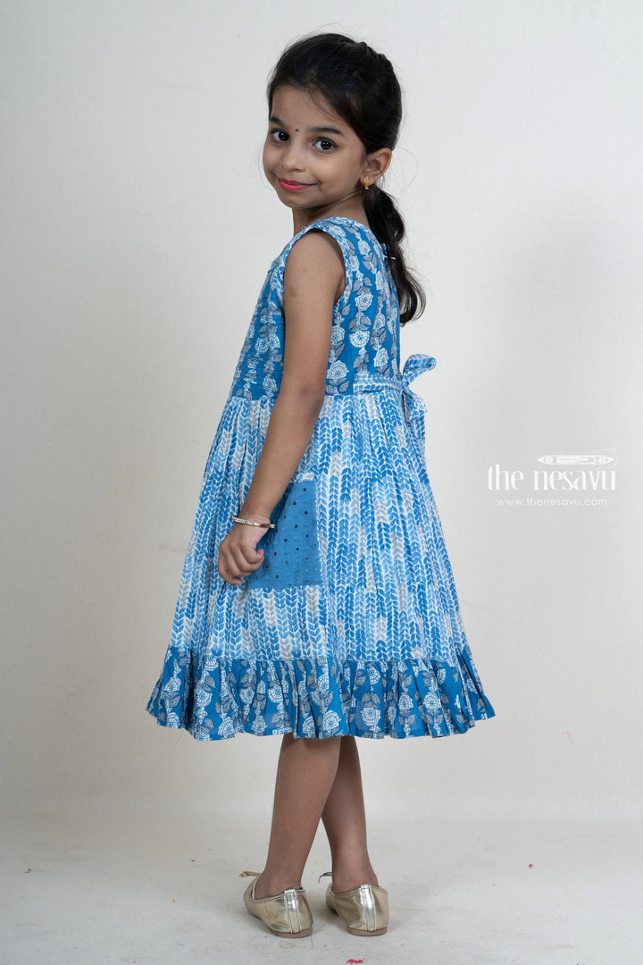 The Nesavu Frocks & Dresses Navy Blue Pin-Tucked Printed Pocket Frock For Girls With Ruffled Hem psr silks Nesavu