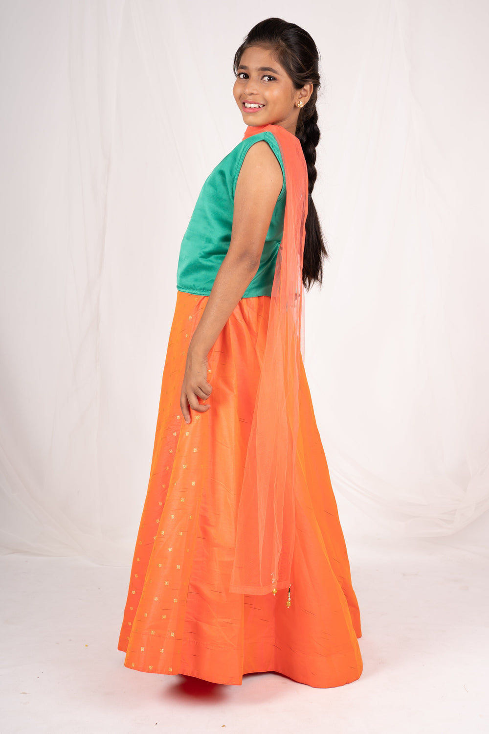 The Nesavu Lehenga & Ghagra Orange Golden Print Raw Silk Skirt With Dark Green Designer Top psr silks Nesavu
