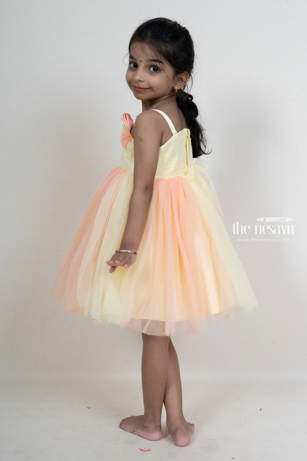 The Nesavu Party Frock Orange With Pink Pretty Party Wear For Girls With Floral Trims psr silks Nesavu