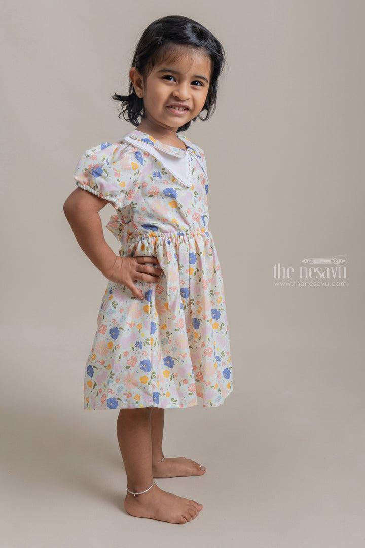 The Nesavu Frocks & Dresses Pastel Yellow Floral All over Printed Dailywear Cotton Frock For Girls psr silks Nesavu