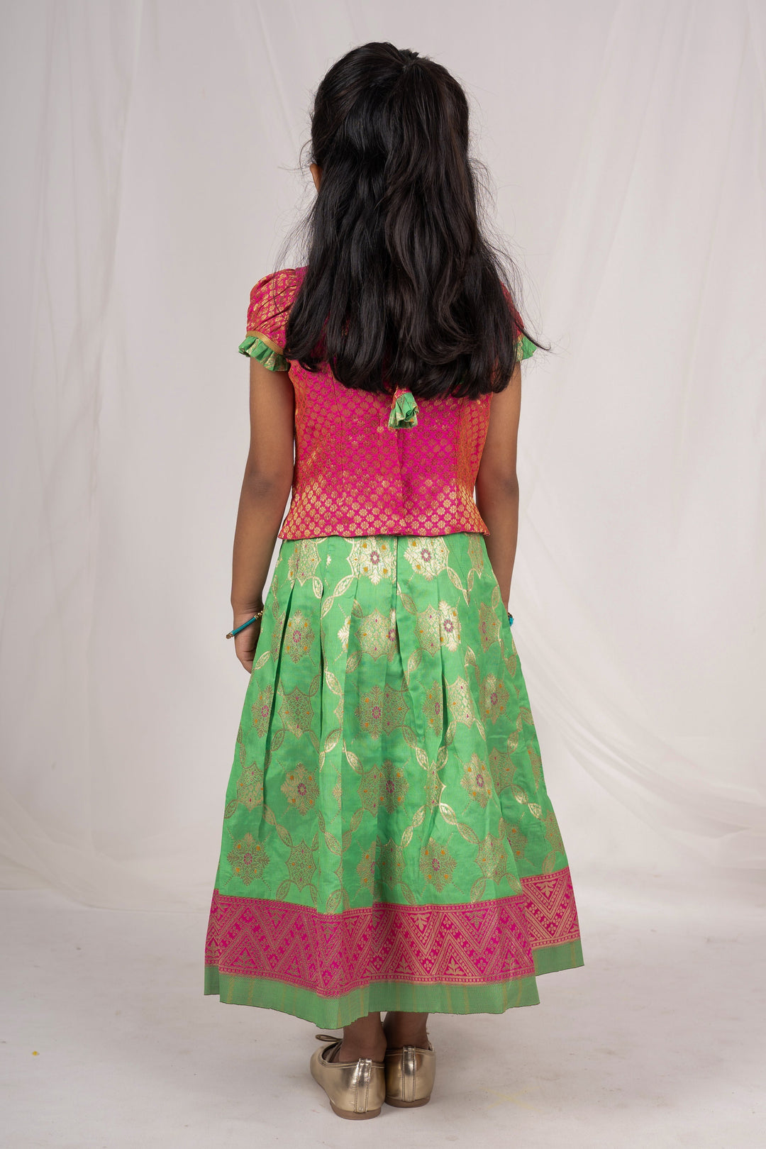 The Nesavu Pattu Pavadai Ramar Green Silk Skirt Attached Brocade Silk Puff Sleeve Blouse For Baby Girls psr silks Nesavu