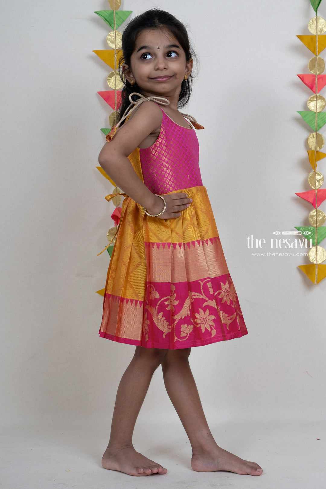 The Nesavu Tie up frocks Yellow With Pink Kanchipuram Silk Jacquard Yoke Tie-Up Gown For New Born Baby Girls psr silks Nesavu